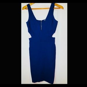 Short fitted royal blue dress cut out sides